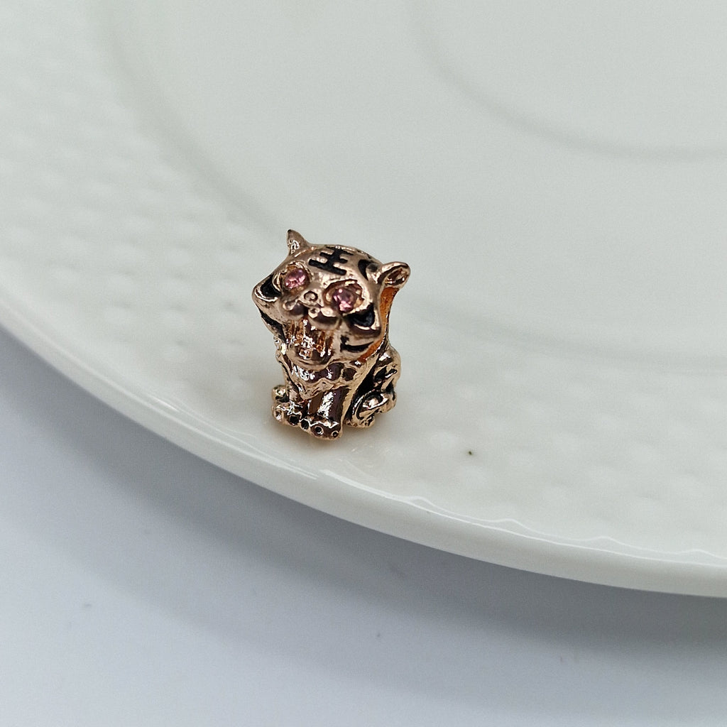 Conta Tigre (ródio)